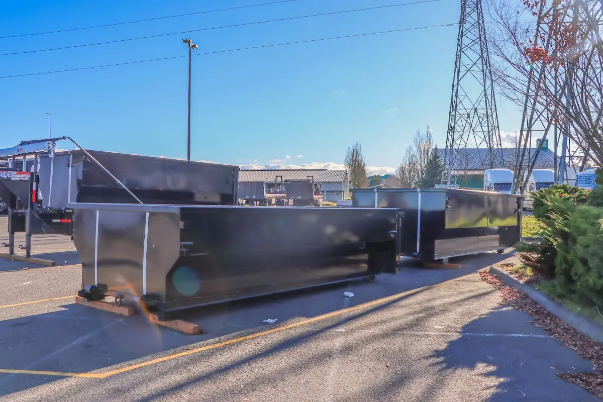 Roll-off dumpster ready for waste disposal at job site for Demolition Dumpster Rental in Maryville